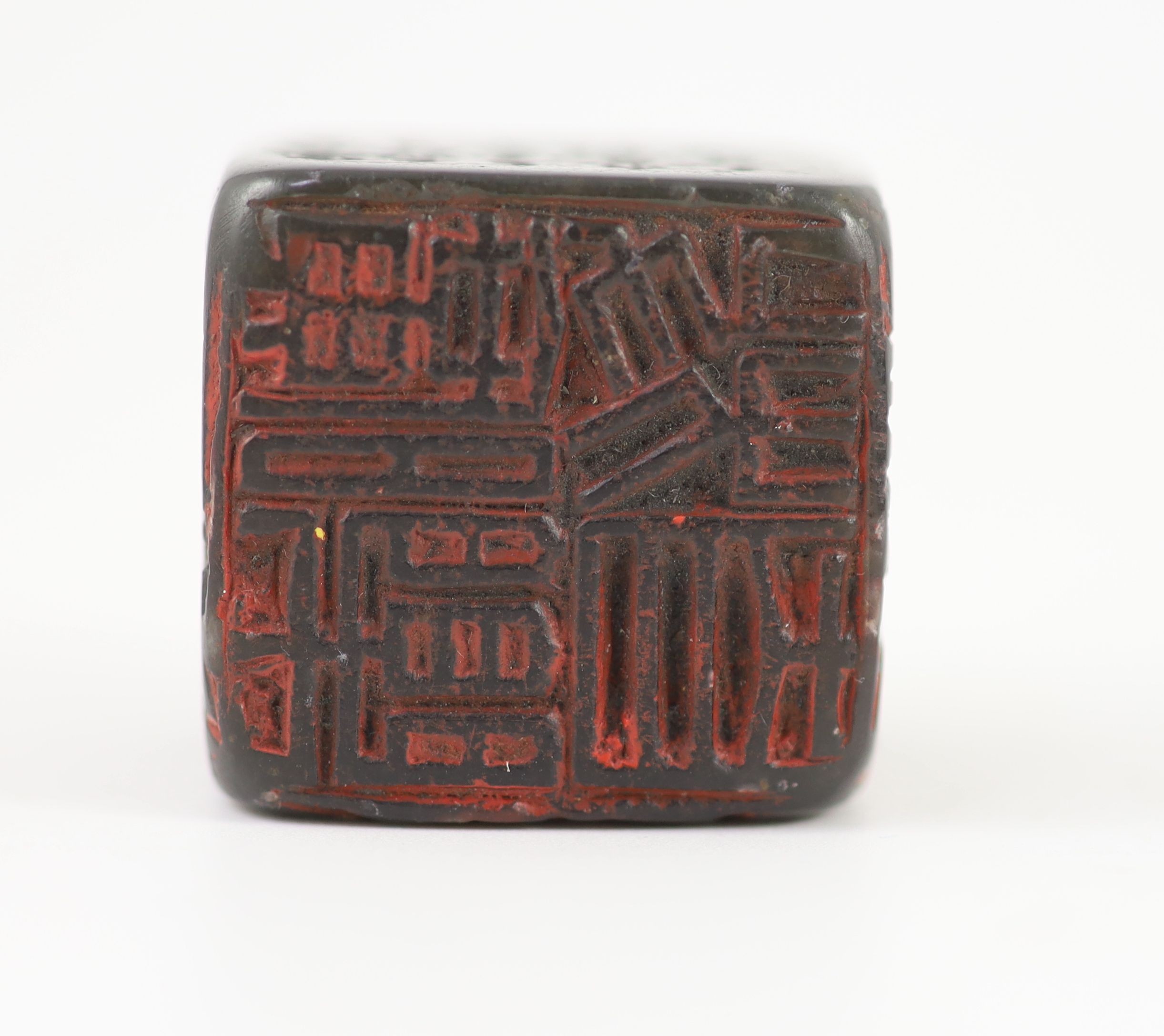 A Chinese dark green soapstone cube shaped seal, probably Qing dynasty, 3 cm